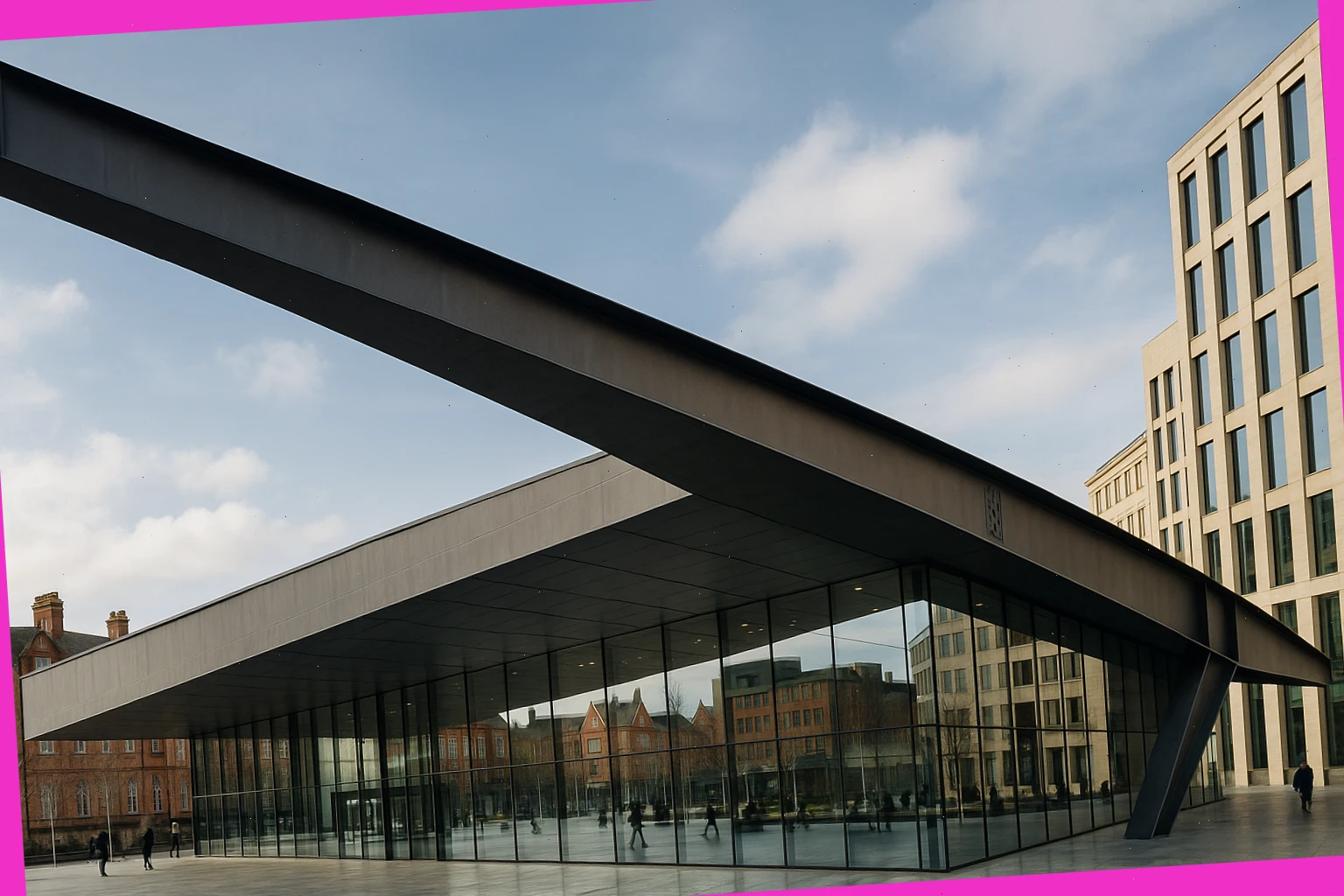 Steel cantilever above a glazed plaza in an English city